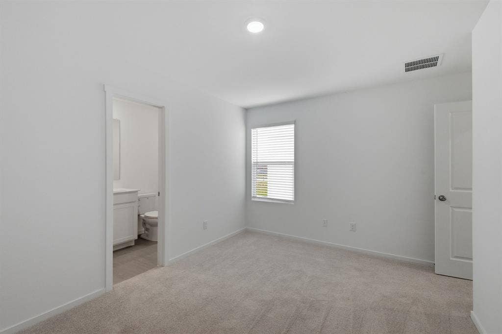 6307 Sandpiper Lane, Princeton, TX 75407 Spacious room featuring neutral carpet flooring, white walls, a single window with blinds, and a flush-mount ceiling light