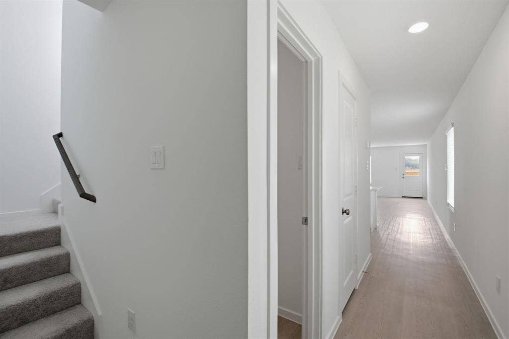 6307 Sandpiper Lane, Princeton, TX 75407 Bright hallway featuring light wood-finish flooring, recessed lighting, and white walls