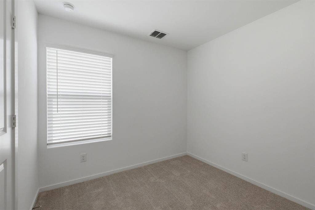 6307 Sandpiper Lane, Princeton, TX 75407 Room featuring light-toned carpeting and neutral wall tones