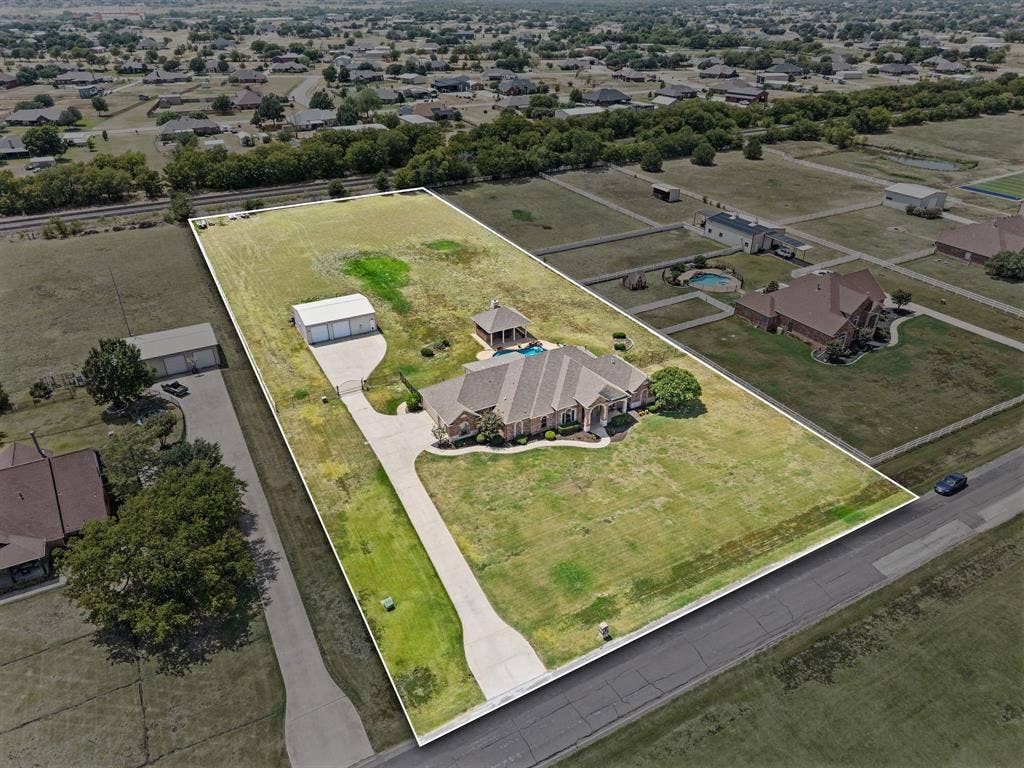 13425 Willow Creek Drive, Haslet, TX 76052 substantial custom home + resort-like outdoor living + serious shop + acreage.