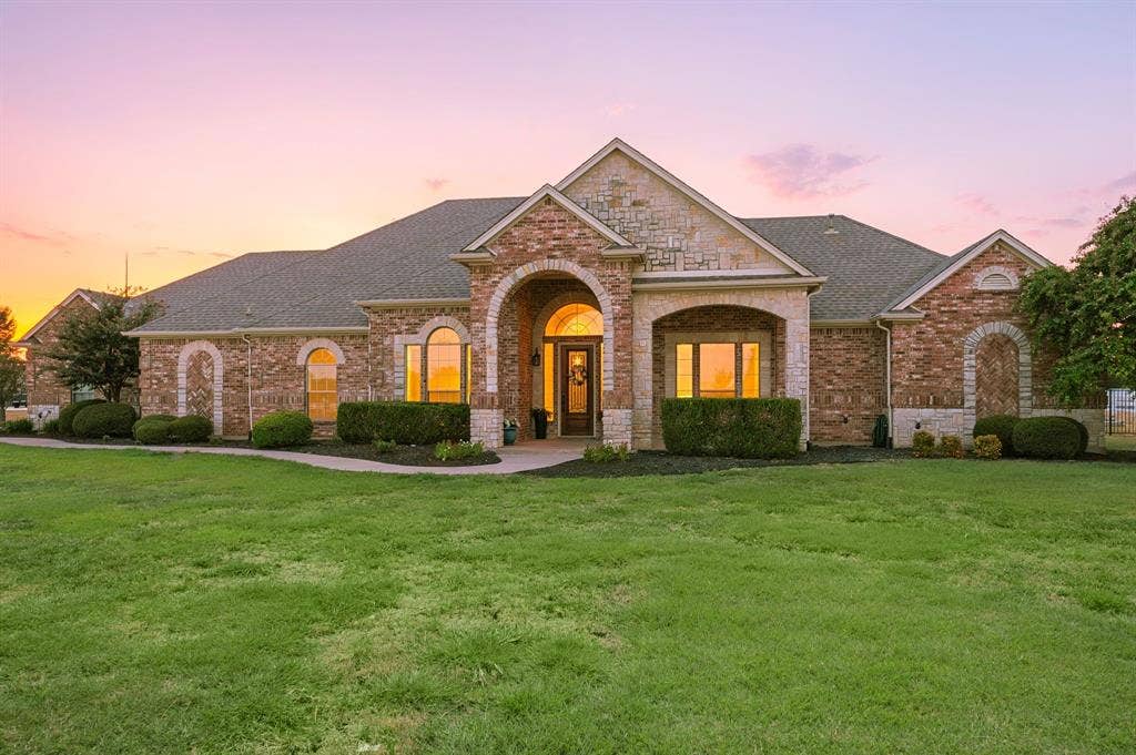 13425 Willow Creek Drive, Haslet, TX 76052 this thoughtfully custom-built home spans nearly 3,700 square feet with a floor plan that balances connection, privacy, and everyday functionality