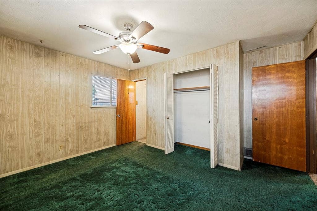 5213 Bonnie Wayne Street, Haltom City, TX 76117 Primary bedroom with attached half bath