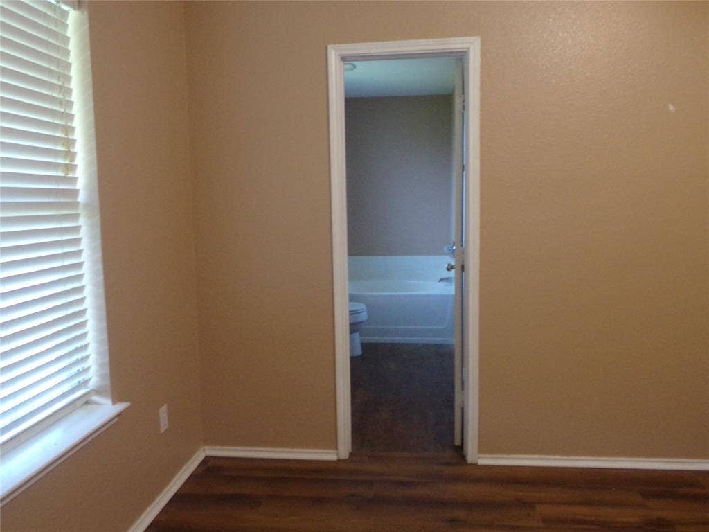 4708 Topaz Lane, Granbury, TX 76049 Primary Bedroom looking into Primary Bathroom