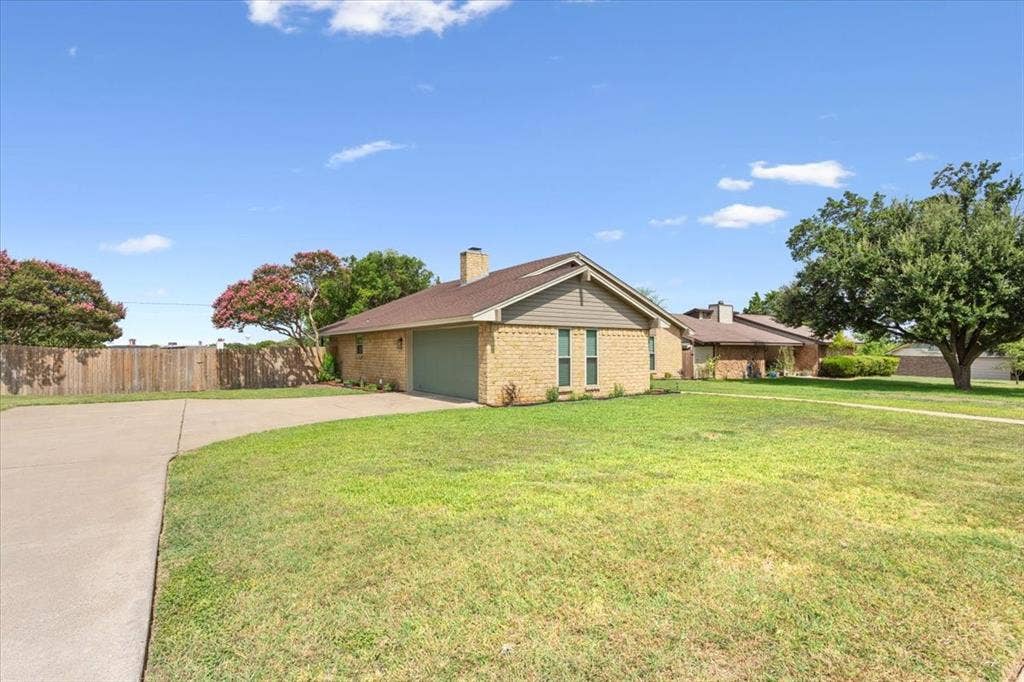 116 Boleman Drive, Hewitt, TX 76643 Driveway view of home with crepe myrtles and fresh landscaping