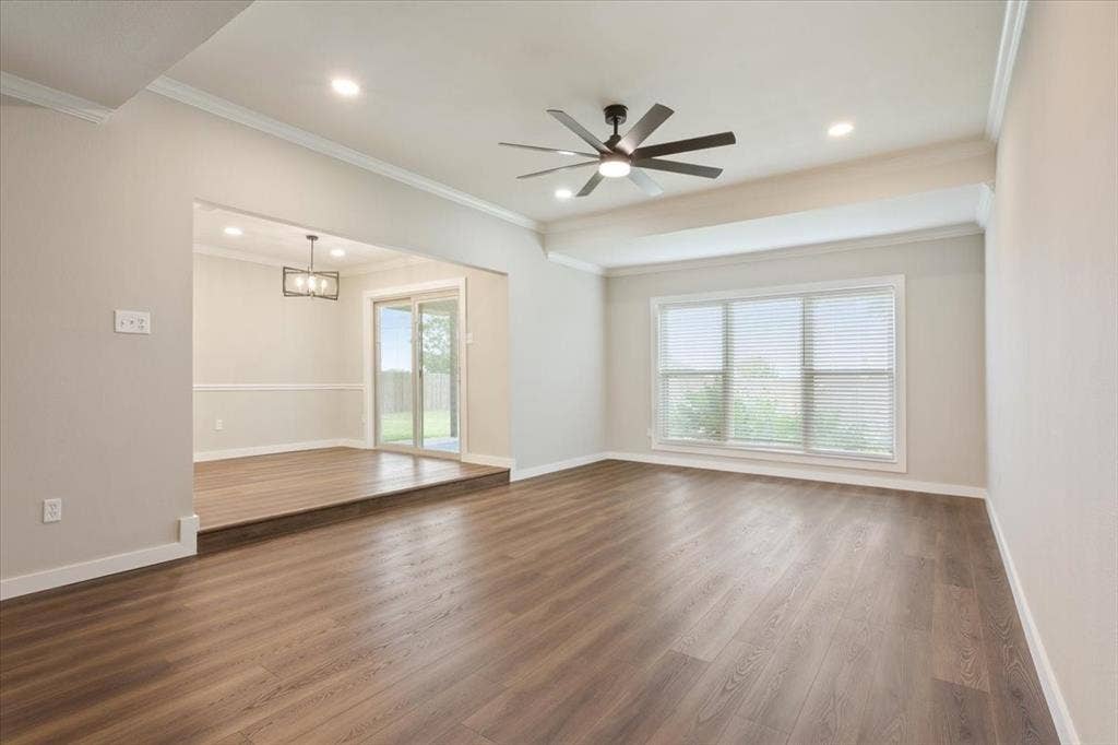 116 Boleman Drive, Hewitt, TX 76643 Luxury vinyl plank flooring throughout, here you are looking from the living room looking into dining area