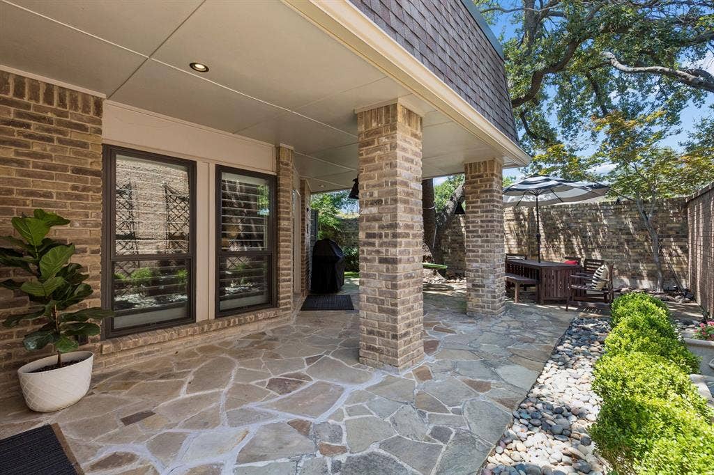 6015 Shetland Drive, Dallas, TX 75230 The flagstone patio has ample space for total outdoor living.