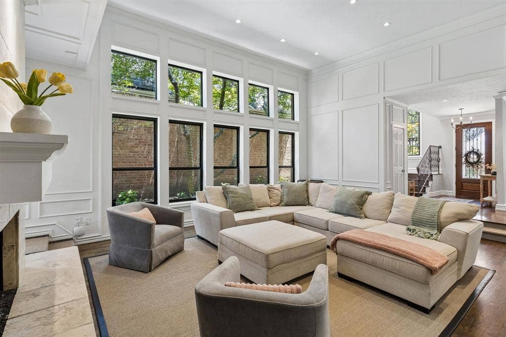 6015 Shetland Drive, Dallas, TX 75230 Our favorite part of this home is the sunken family room and wall of windows.