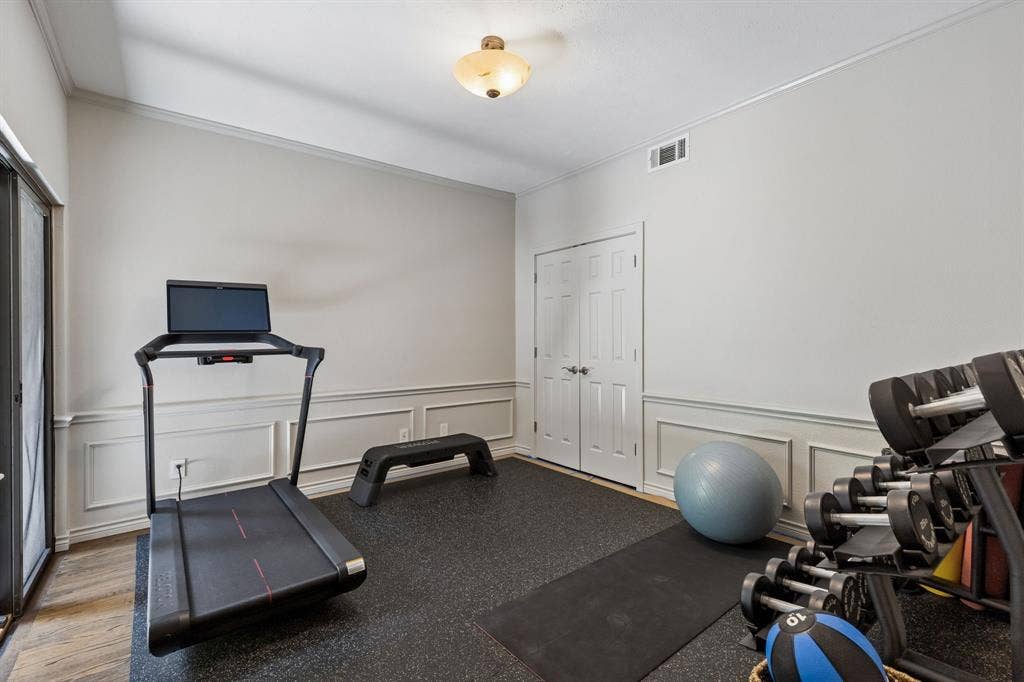 6015 Shetland Drive, Dallas, TX 75230 Currently used as an exercise room, but is a great guest room or home office with sliding door to secondary patio.