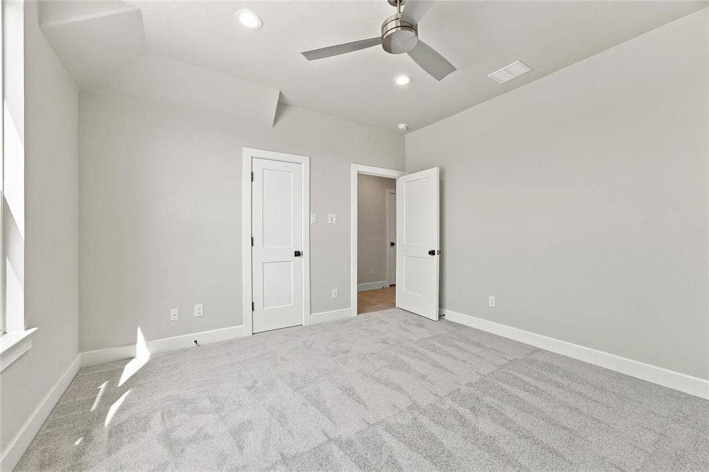 3820 Jacks Loop, Midlothian, TX 76065 Recessed lighting, ceiling fan, white paneled doors, light grey carpeting, and white trim
