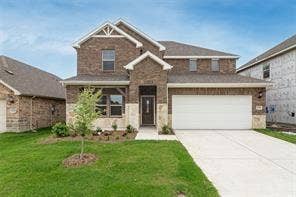 448 Ella Lane, Fate, TX 75087 Two-story brick and stone exterior with gabled roof lines