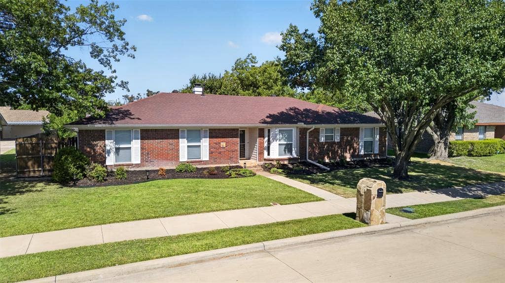 4213 Cheyenne Drive, Rowlett, TX 75088 Well maintained landscaping