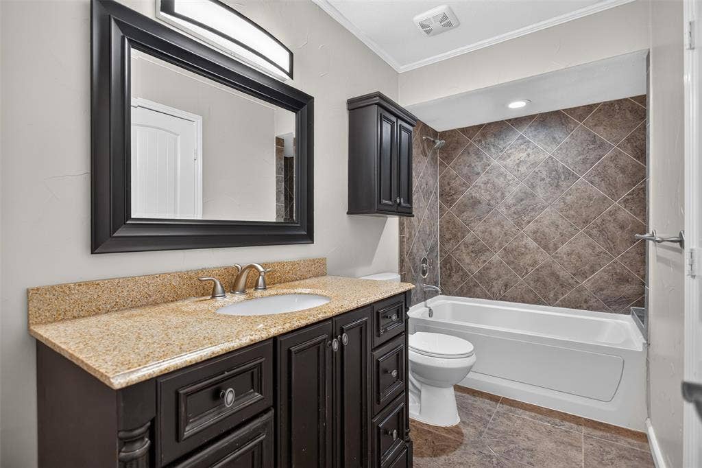 4213 Cheyenne Drive, Rowlett, TX 75088 Primary bath boasts of tile surround and granite counter top.