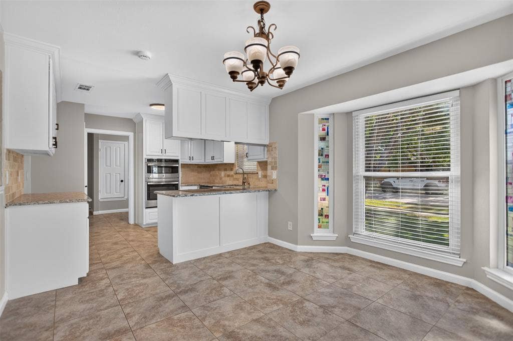 4213 Cheyenne Drive, Rowlett, TX 75088 Breakfast area looking into the kitchen.