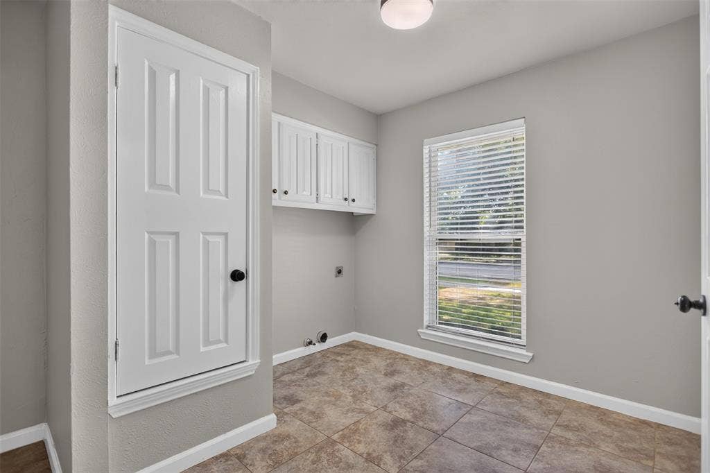 4213 Cheyenne Drive, Rowlett, TX 75088 Laundry room has space for fridge or freezer