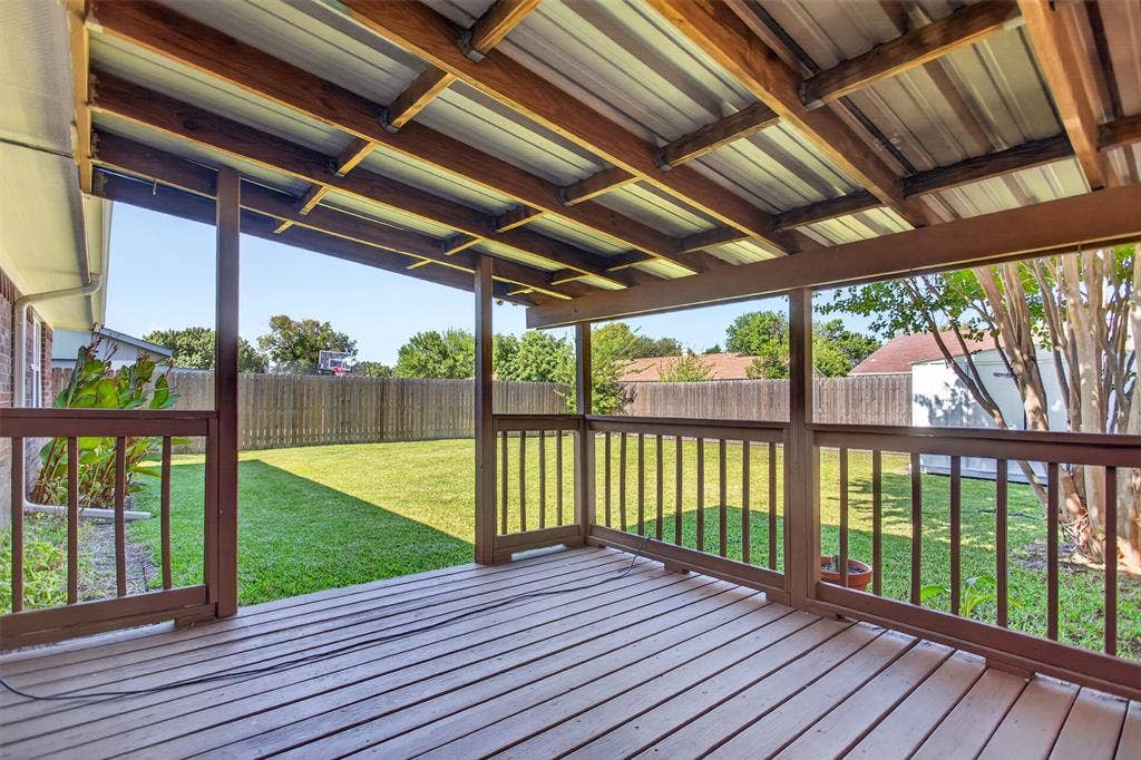 4213 Cheyenne Drive, Rowlett, TX 75088 Covered deck is the perfect spot to relax or entertain.