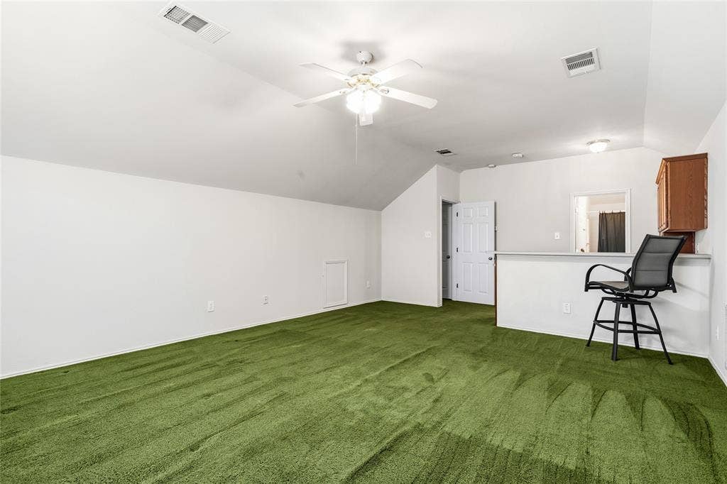 1612 Lakeside Drive, Glenn Heights, TX 75154 Guest suite. Large enough for both sitting and sleeping areas.