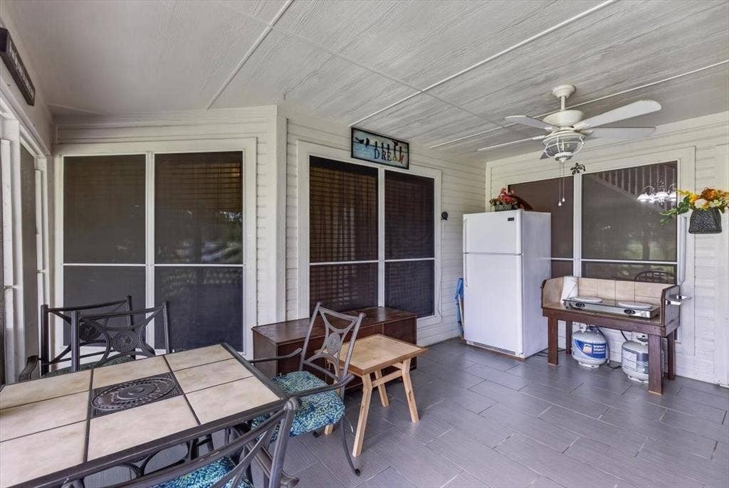 10165 Bantry Lane, Forney, TX 75126 Screened patio with tile flooring