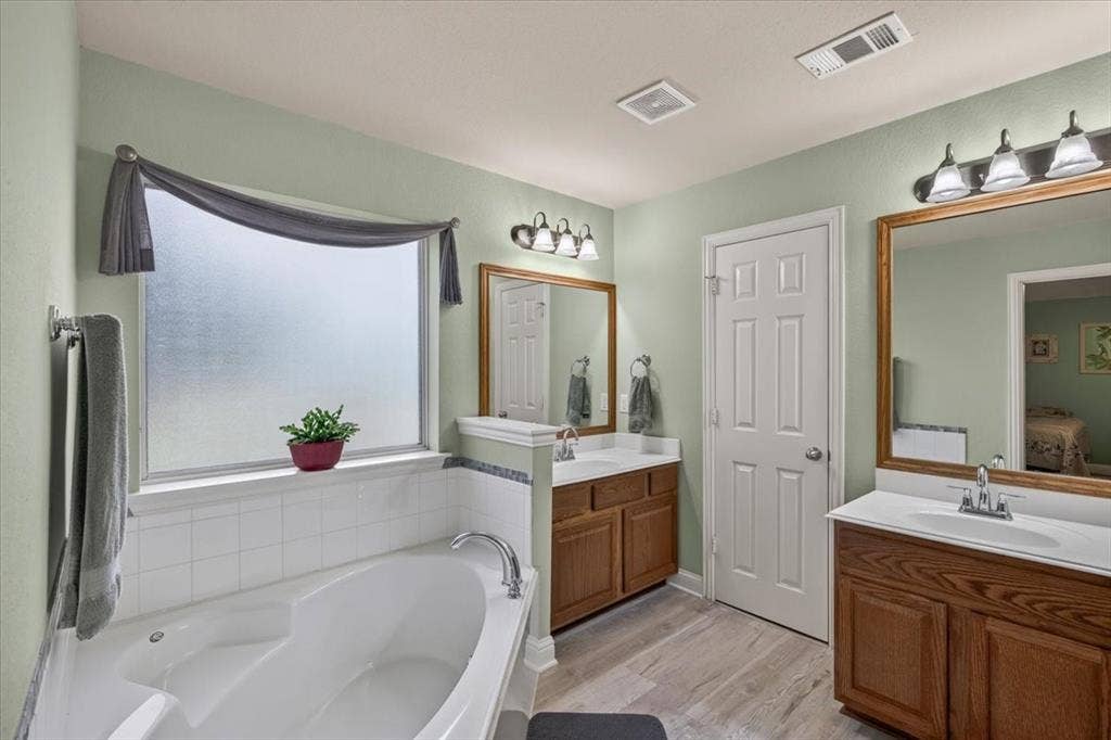 10165 Bantry Lane, Forney, TX 75126 double sinks, garden tub, separate shower and walk in closet