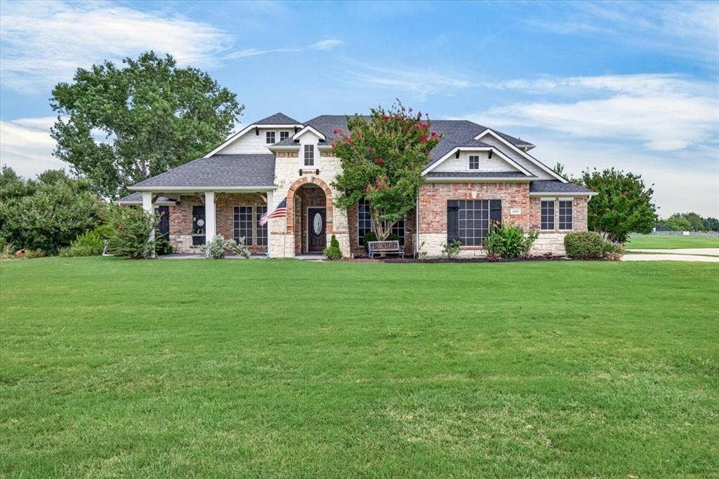 10165 Bantry Lane, Forney, TX 75126 Covered front porch with stone accents