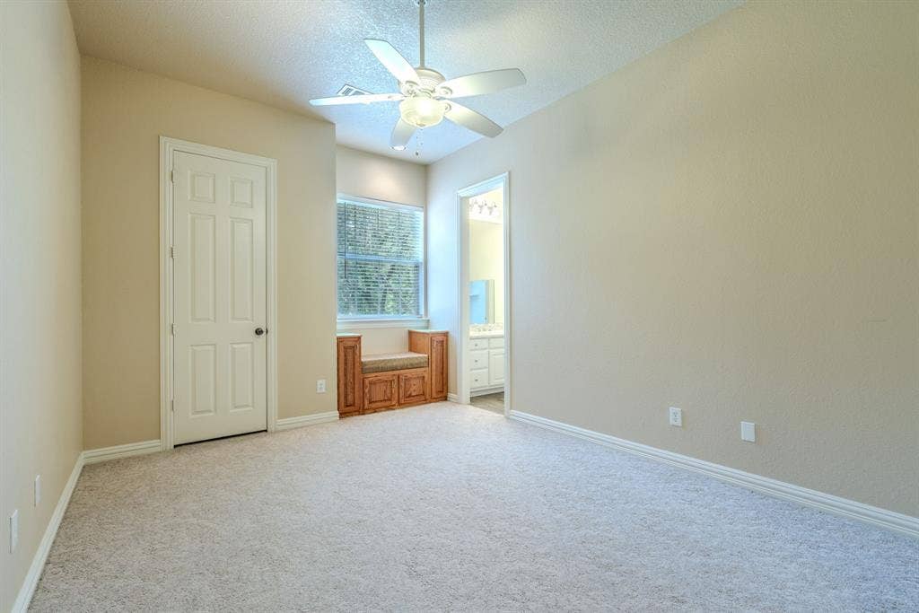 6420 Shady Oaks Lane, Midlothian, TX 76065 Bedroom 3 with built-in banquet seating, large window with natural light and huge walk-in closet.