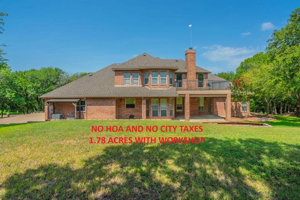 6420 Shady Oaks Lane, Midlothian, TX 76065 View of the back of the house. Plenty of room here for a pool!