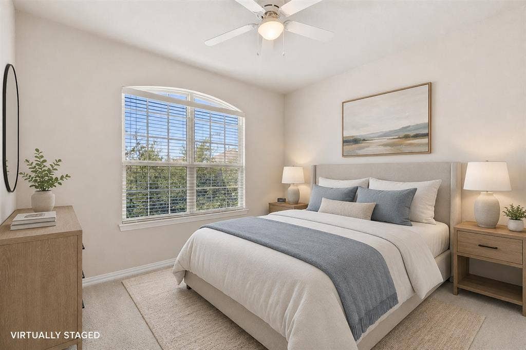 4109 Rainey Street, McKinney, TX 75070 Room featuring an arched window, ceiling fan with integrated lighting, and neutral wall tones