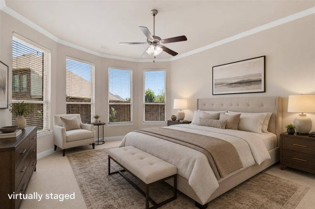 4109 Rainey Street, McKinney, TX 75070 Tray ceiling with crown molding, multiple windows, ceiling fan, and carpeted flooring