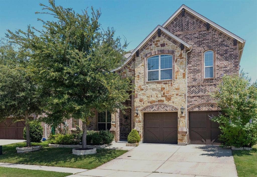 4109 Rainey Street, McKinney, TX 75070 Stone and brick facade with arched accents