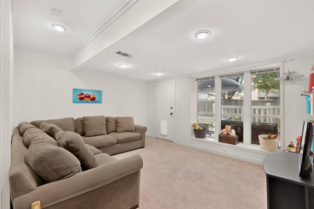 2003 J J Pearce Drive, Richardson, TX 75081 Carpeted interior space featuring recessed lighting and crown molding