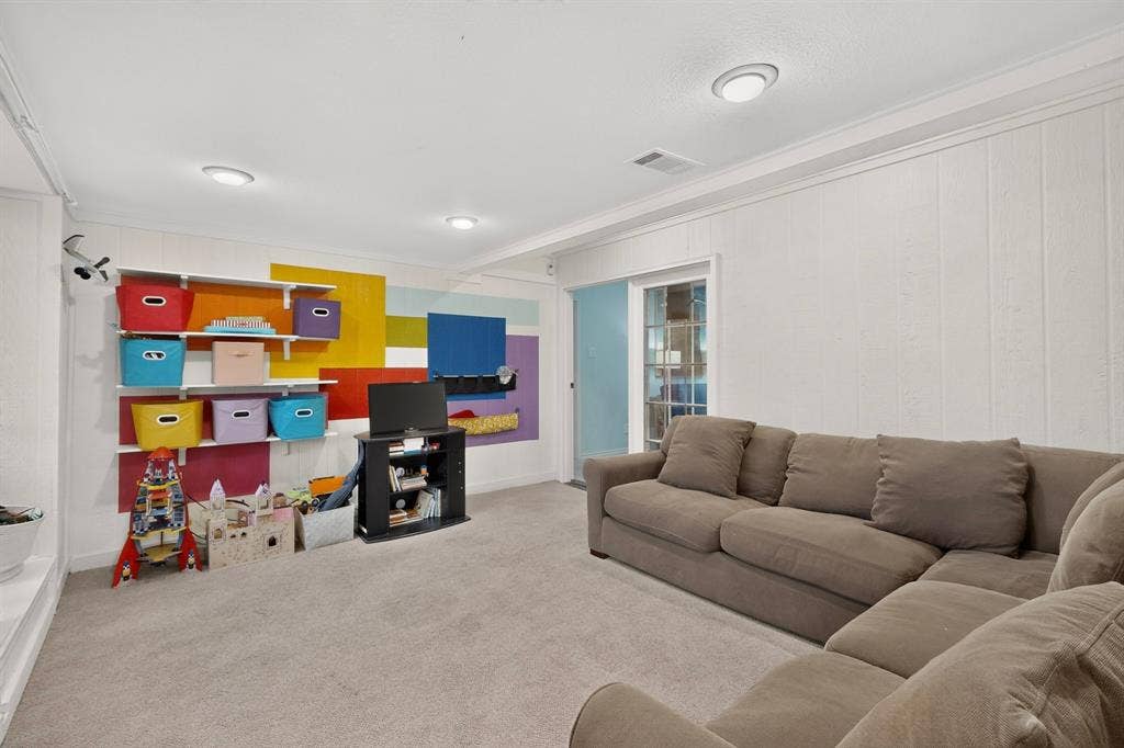 2003 J J Pearce Drive, Richardson, TX 75081 Spacious interior room featuring light-colored carpeting and white paneled walls