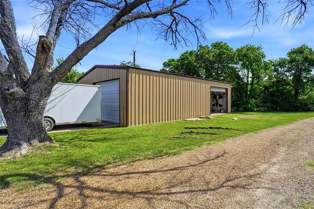 8983 W Odneal Road, Krum, TX 76249 Shop could be transformed into a dog breeding area