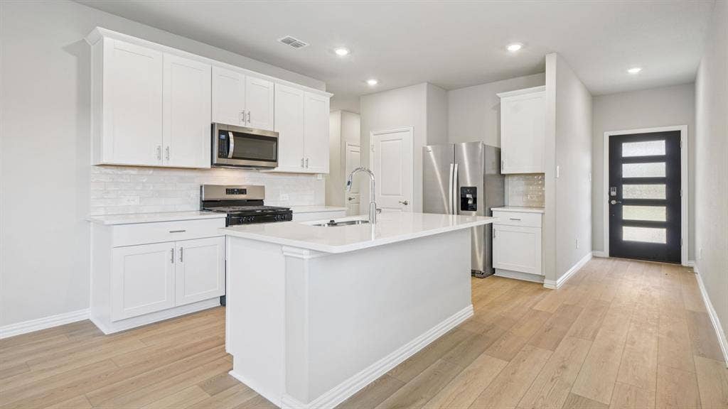 202 Winchester Hill Lane, Princeton, TX 75071 Photo is not of the actual home, but is an inspirational photo of builder’s model home and may depict options, furnishings, and/or decorator features that are not included