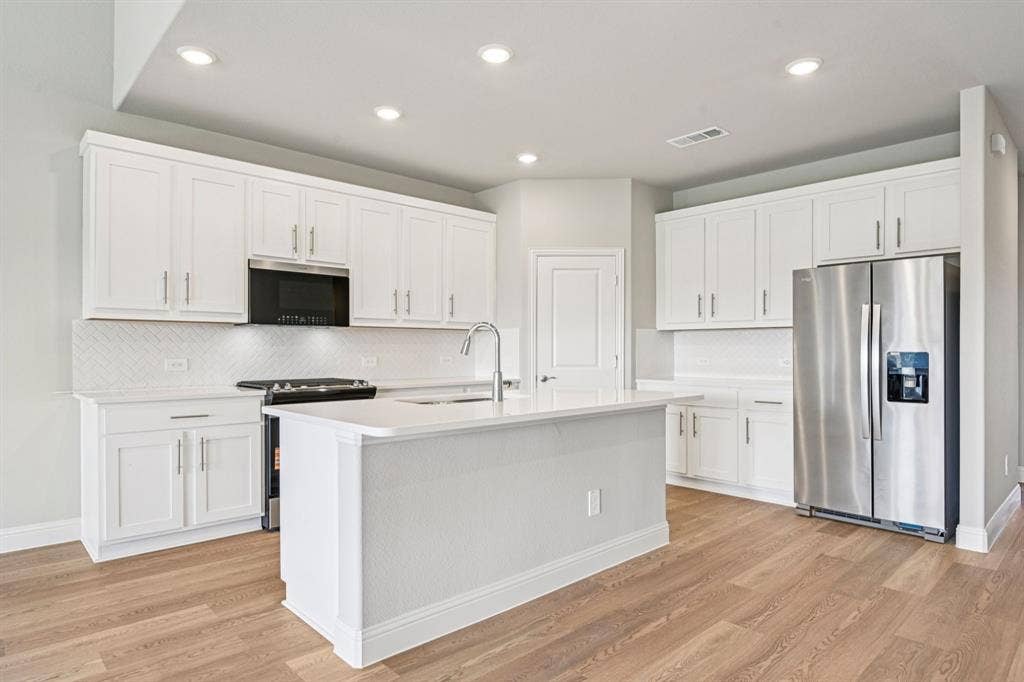 Photo is not of the actual home, but is an inspirational photo of builder’s model home and may depict options, furnishings, and/or decorator features that are not included.