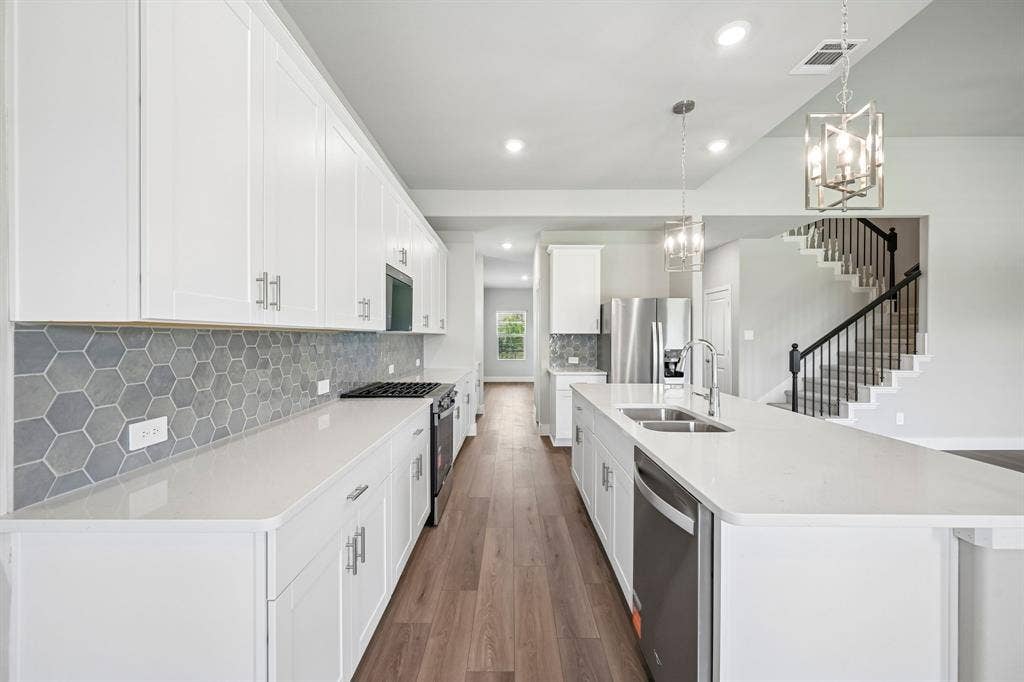 1303 Winters Way, Princeton, TX 75071 Photo is not of the actual home, but is an inspirational photo of builder’s model home and may depict options, furnishings, and/or decorator features that are not included.