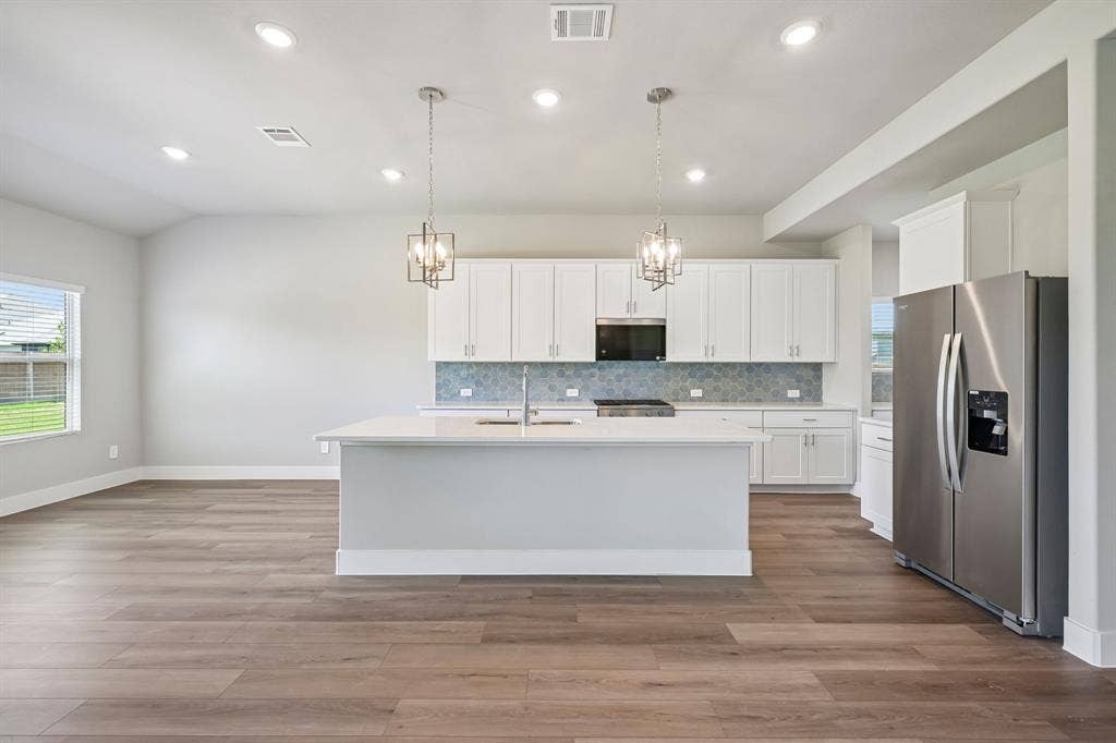 1303 Winters Way, Princeton, TX 75071 Photo is not of the actual home, but is an inspirational photo of builder’s model home and may depict options, furnishings, and/or decorator features that are not included.