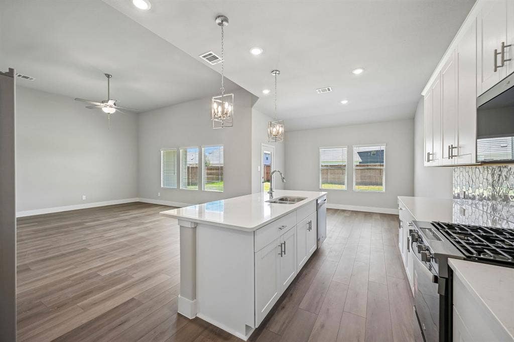 1303 Winters Way, Princeton, TX 75071 Photo is not of the actual home, but is an inspirational photo of builder’s model home and may depict options, furnishings, and/or decorator features that are not included.