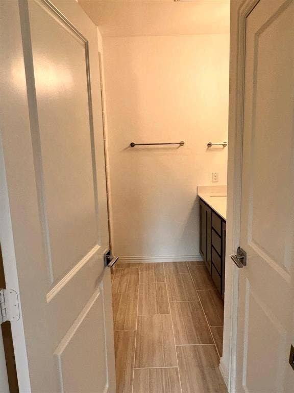 1054 Old Rosebud Drive, Allen, TX 75013 Neutral-toned ceramic tile flooring, white baseboards, and light wall finishes