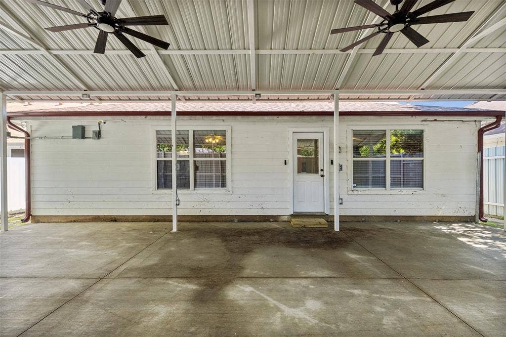 8614 Torreon Court, Dallas, TX 75217 Doorway to property with ceiling fan and a patio area