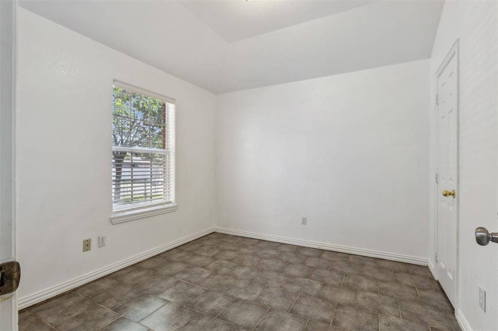 8614 Torreon Court, Dallas, TX 75217 View of tiled spare room