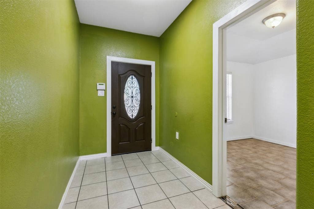 8614 Torreon Court, Dallas, TX 75217 View of tiled entrance foyer