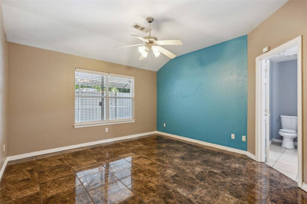 8614 Torreon Court, Dallas, TX 75217 Tiled spare room with ceiling fan