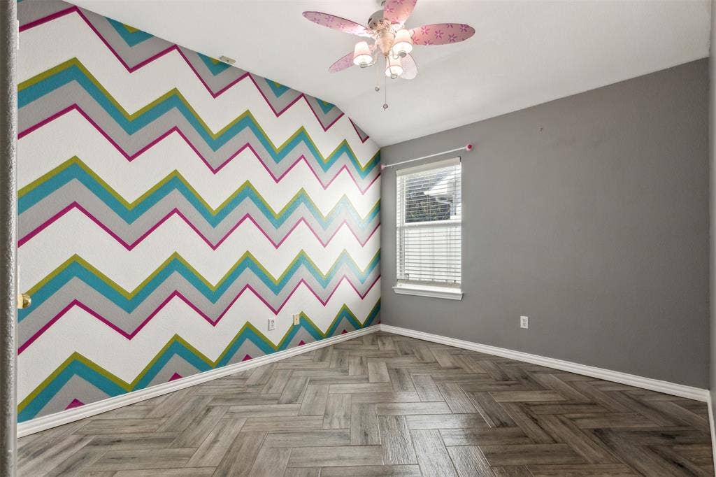 8614 Torreon Court, Dallas, TX 75217 Spare room featuring ceiling fan and parquet flooring