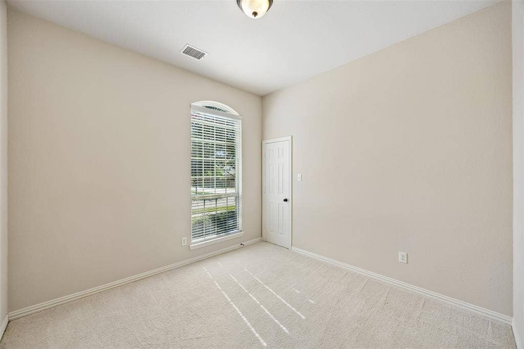 Secondary bedroom with large walk in closet