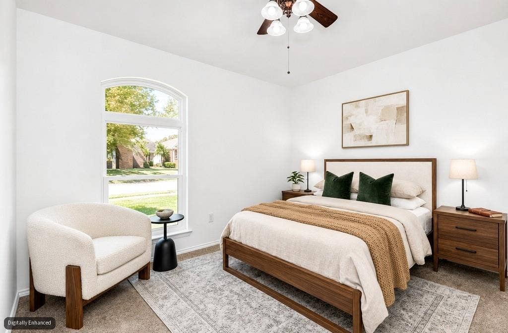 11404 Amber Valley Drive, Frisco, TX 75035 Arched window providing ample natural light, ceiling fan with integrated lighting, and neutral wall tones
