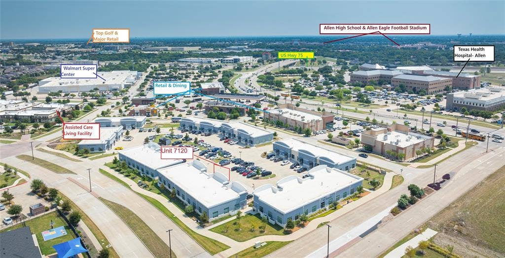 945 Stockton Drive, #7120, Allen, TX 75013 Aerial perspective showcasing a commercial development with multiple buildings and a parking lot