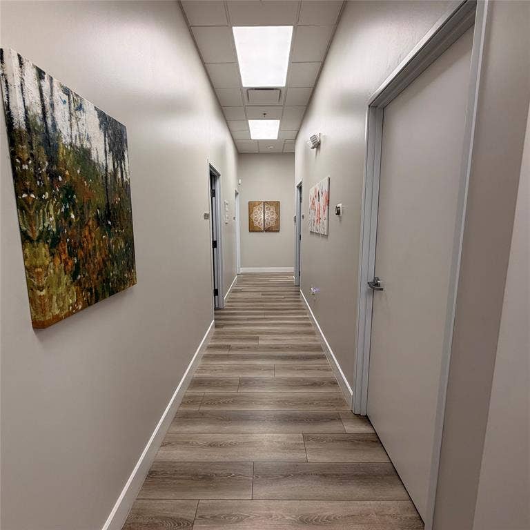 945 Stockton Drive, #7120, Allen, TX 75013 Hallway featuring wood-finish flooring, recessed lighting, and a drop ceiling