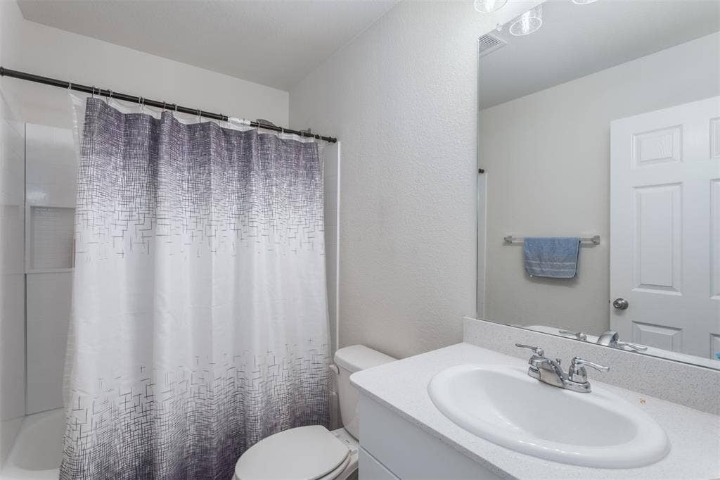 859 Table Rock Street, Princeton, TX 75407 Full bath downstairs creates flexibilty for the downstairs flex room.