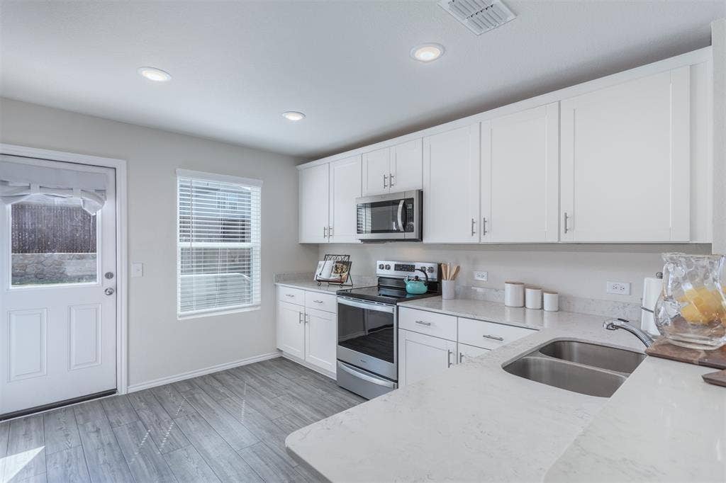 859 Table Rock Street, Princeton, TX 75407 Popcorn , soda, coffee anyone? This kitchen has a place for everything.