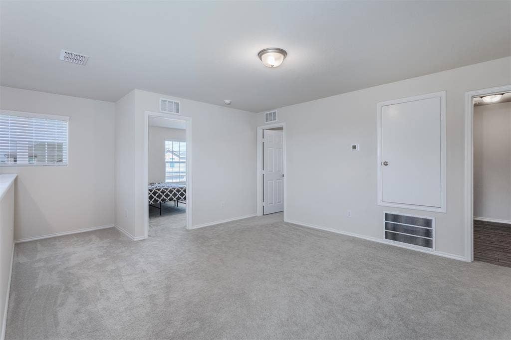 859 Table Rock Street, Princeton, TX 75407 Large Game Room is located upstairs and provides the perfect space for a second tv, play area and more.