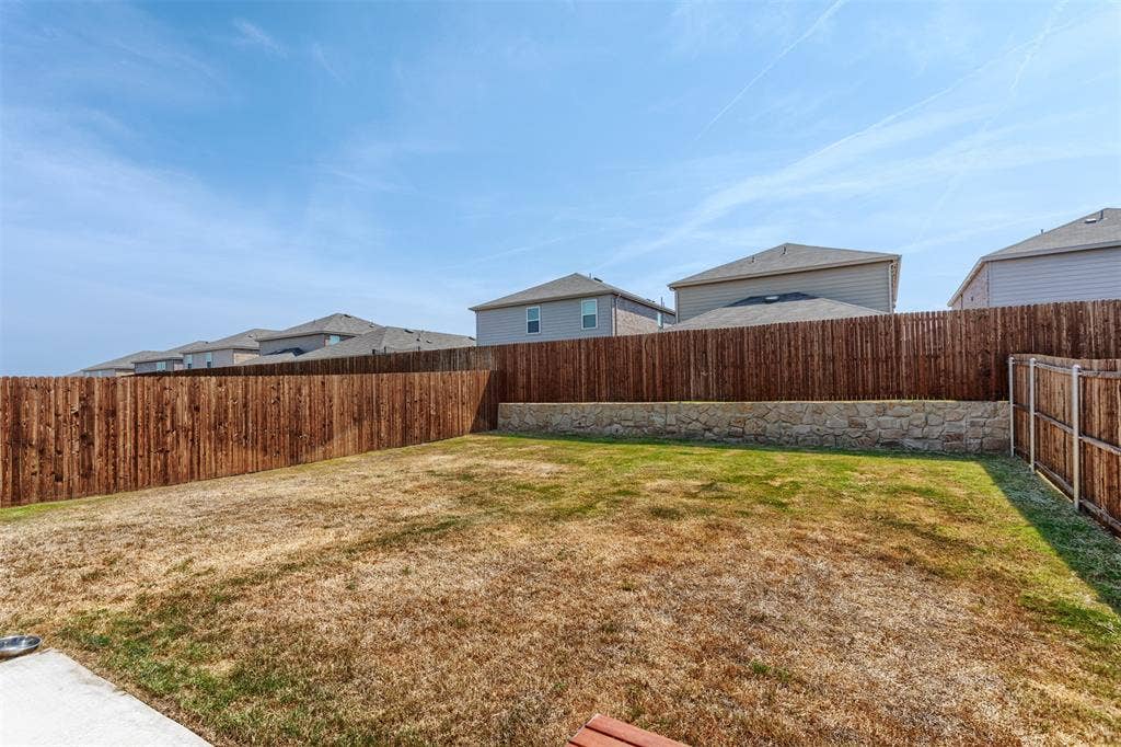 859 Table Rock Street, Princeton, TX 75407 Spacious backyard.